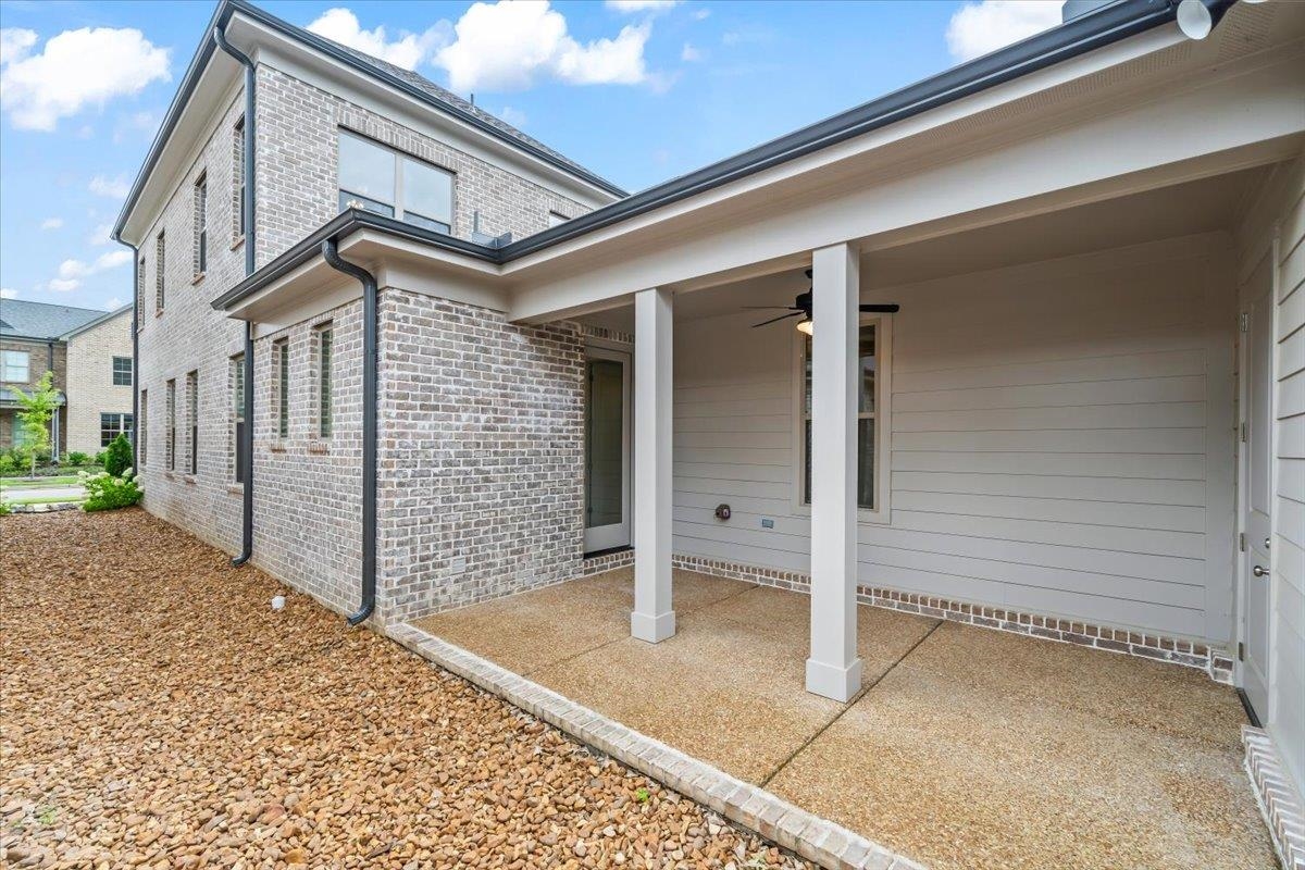 499 Armel Drive Collierville, TN 38017 - Photo 28 of 40 a view of a house with a wooden fence