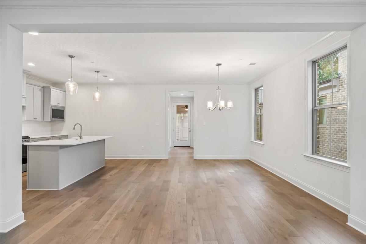 499 Armel Drive Collierville, TN 38017 - Photo 8 of 40 a view of kitchen with sink and wooden floor