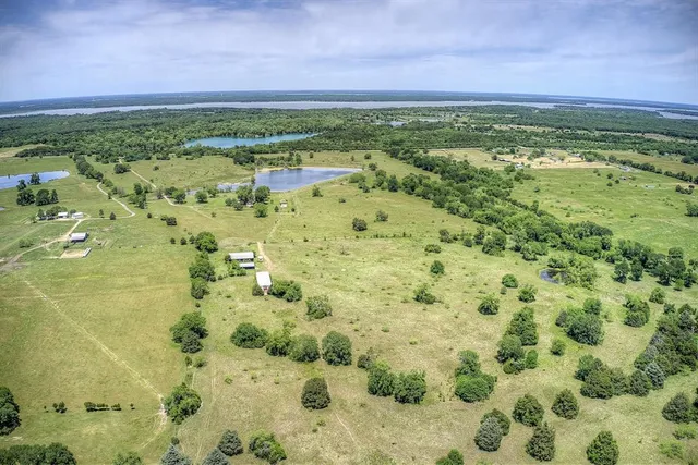 a view of a city with green space