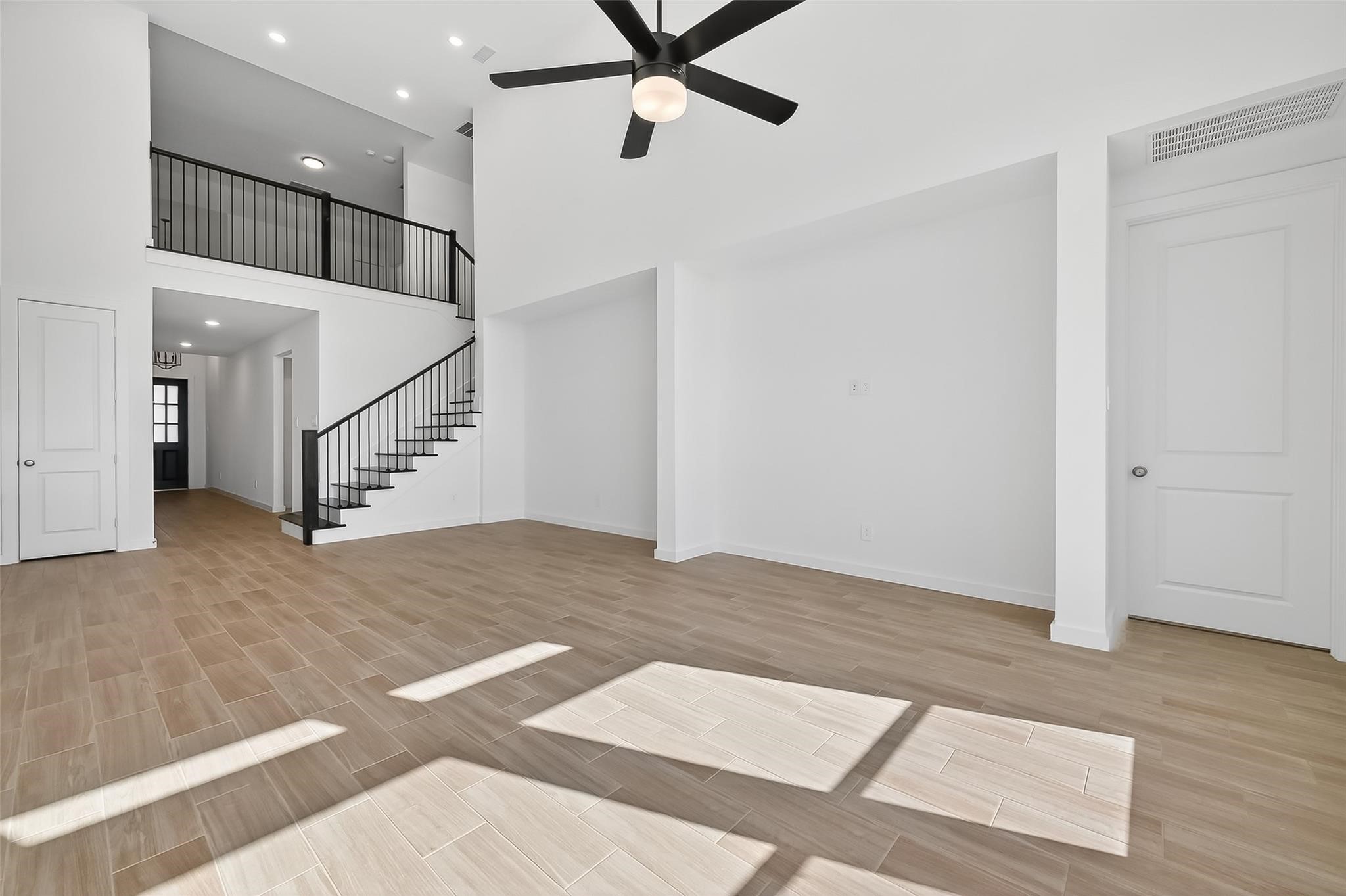 3222 Kindred Way Richmond, TX 77406 - Photo 14 of 50 a view of a hallway with a ceiling fan