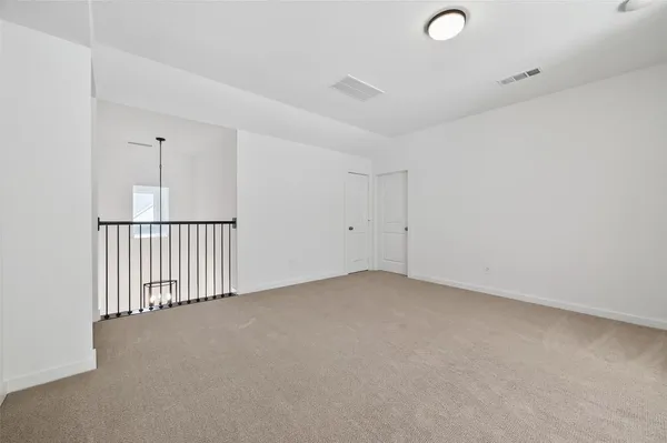 a view of a livingroom with a staircase