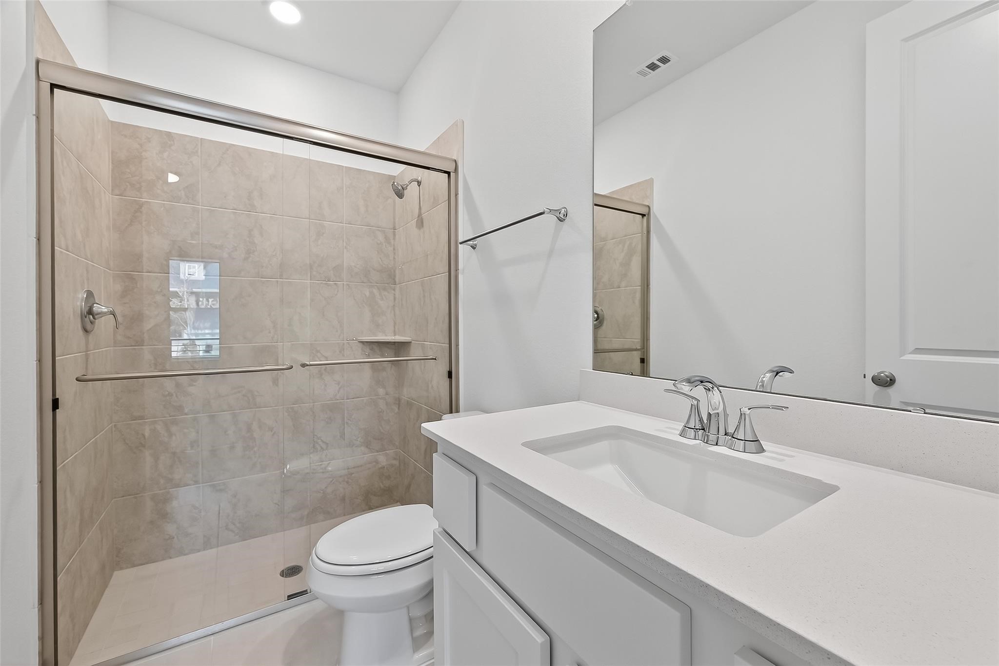 3222 Kindred Way Richmond, TX 77406 - Photo 30 of 50 a bathroom with a sink toilet and shower
