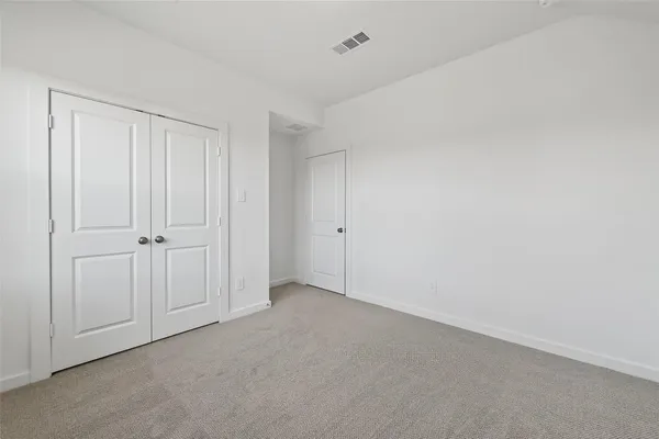 a bathroom with a sink toilet and vanity