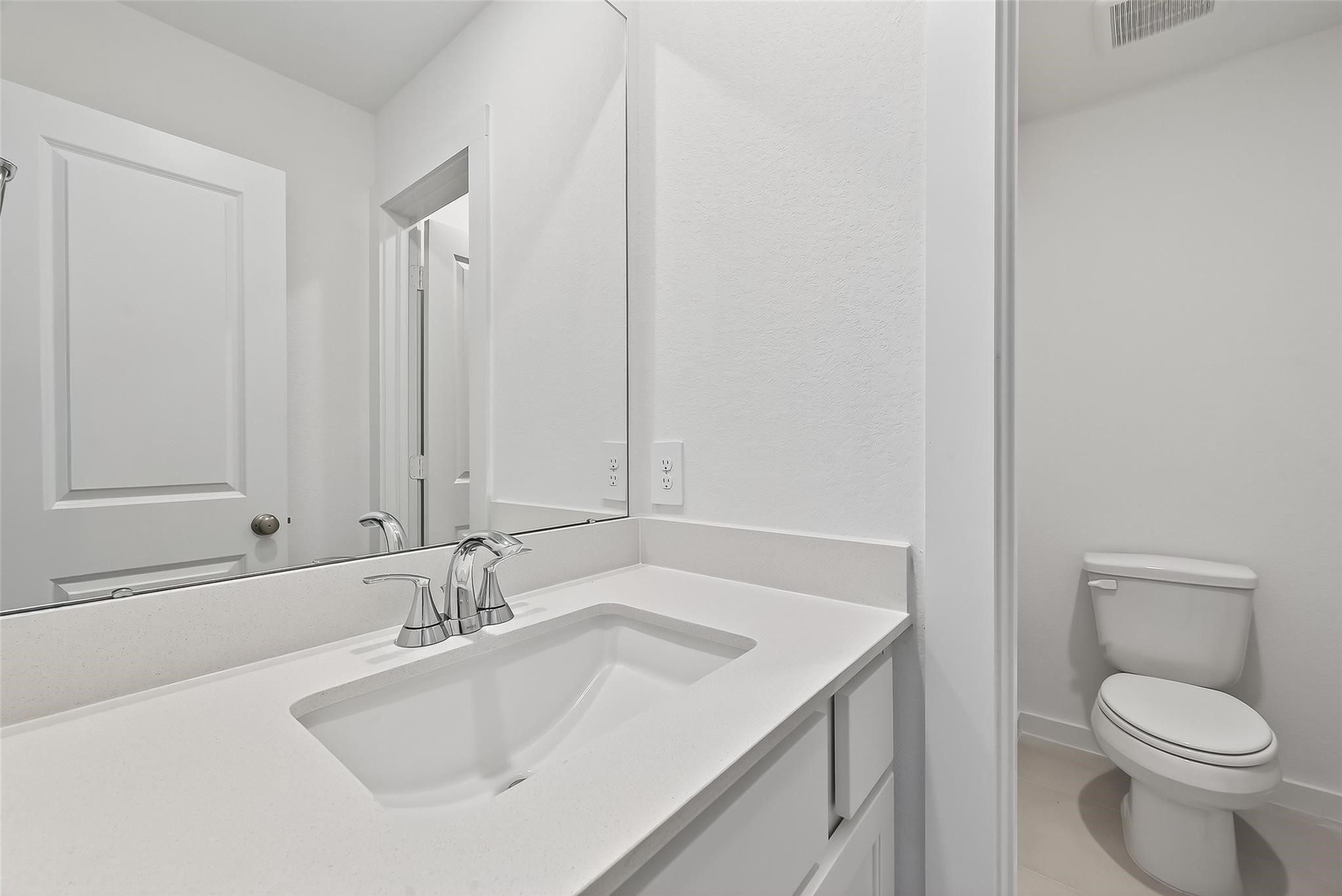 3222 Kindred Way Richmond, TX 77406 - Photo 41 of 50 a bathroom with a sink toilet and vanity