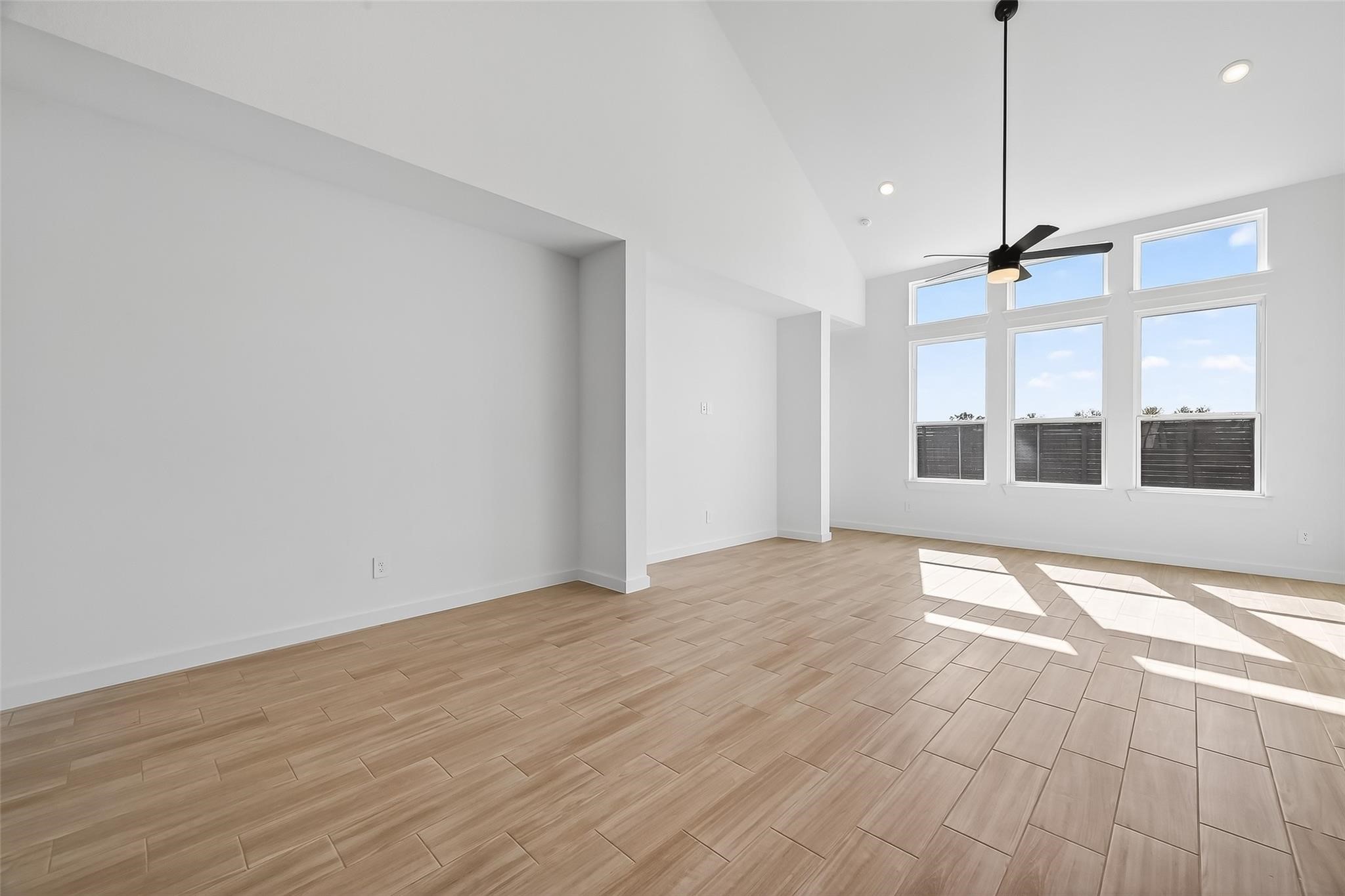 3222 Kindred Way Richmond, TX 77406 - Photo 7 of 50 a view of an empty room with windows