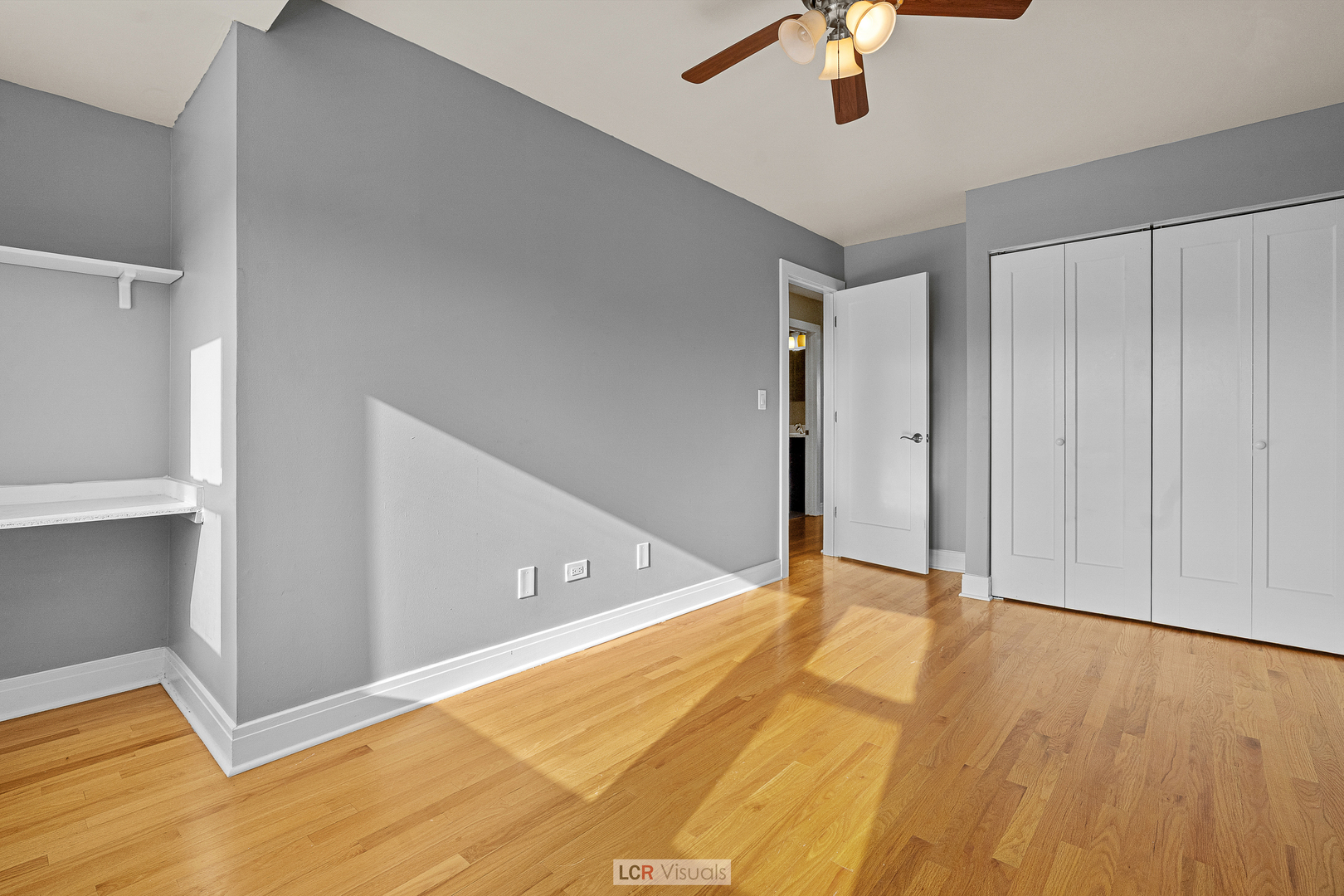 3422 West 13th Place, Unit 2 Chicago, IL 60623 - Photo 10 of 13 a view of an empty room and chandelier fan