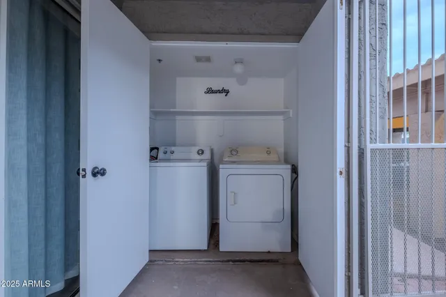 a utility room with dryer and washer