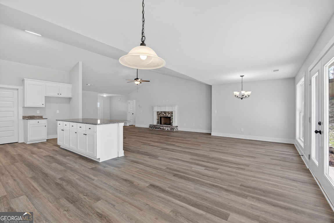 110 Chad Walk, Unit 56 Statham, GA 30666 - Photo 16 of 53 a view of a kitchen with a sink and wooden floor