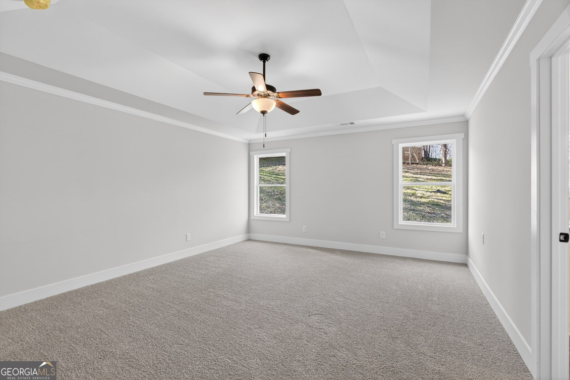110 Chad Walk, Unit 56 Statham, GA 30666 - Photo 39 of 53 a view of an empty room with a window