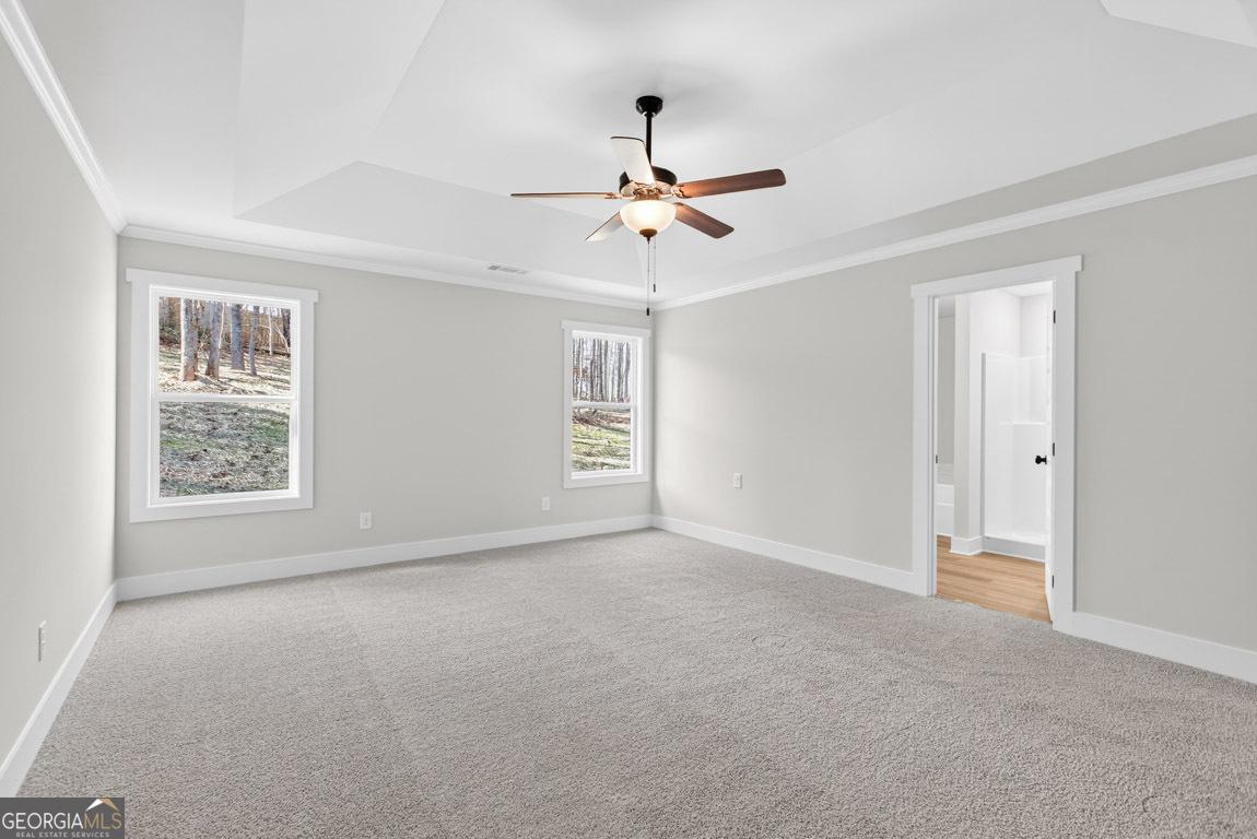 110 Chad Walk, Unit 56 Statham, GA 30666 - Photo 41 of 53 an empty room with windows and fan
