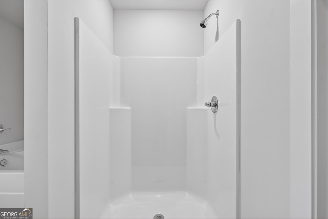 110 Chad Walk, Unit 56 Statham, GA 30666 - Photo 48 of 53 a bathroom with a shower