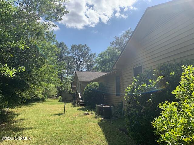 209 Bonnie Brook Road Aberdeen, NC 28315 - Photo 10 of 17 Back view of 5-9