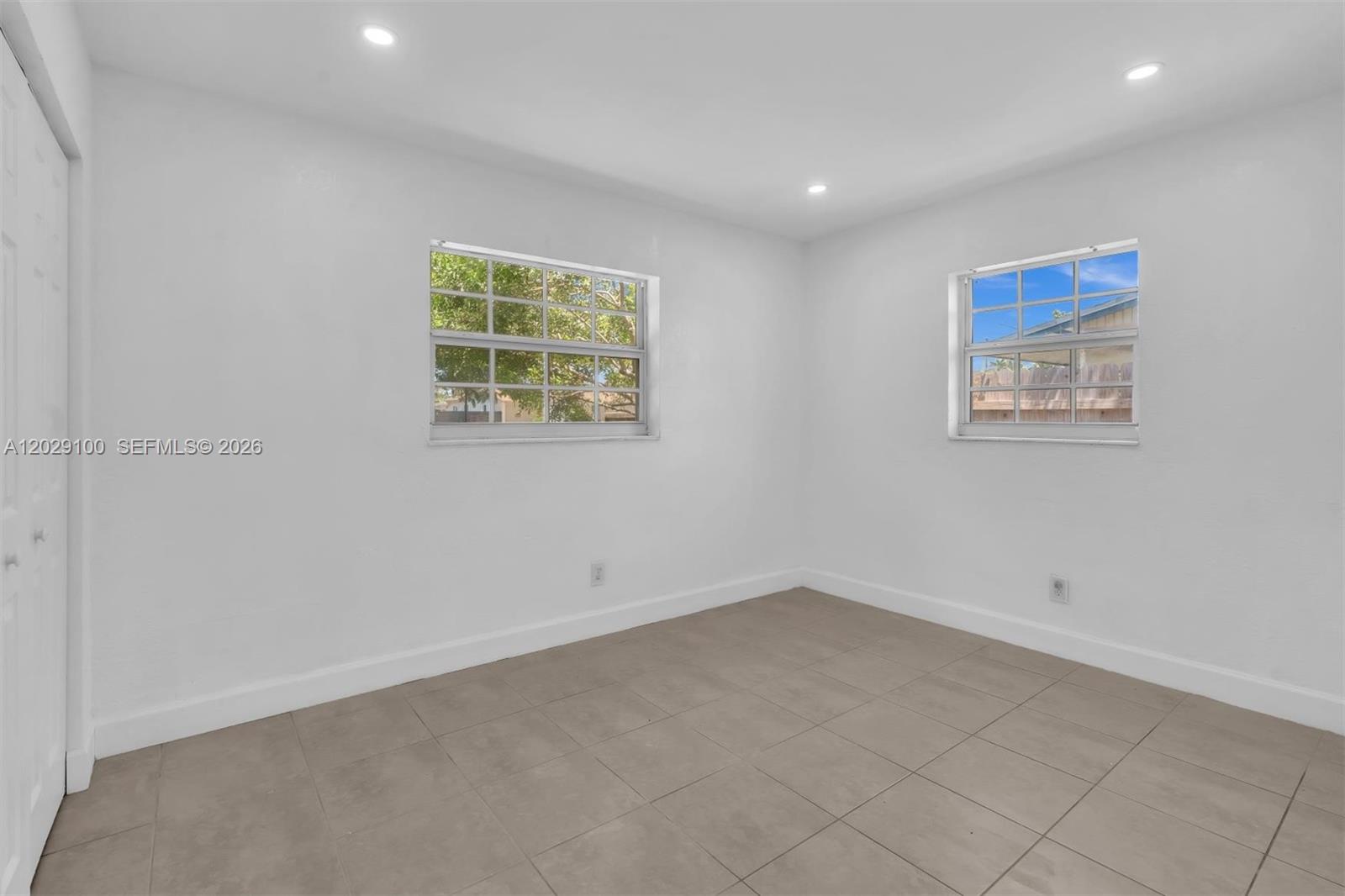 11790 Southwest 34th Street Miami, FL 33175 - Photo 32 of 56 an empty room with a window