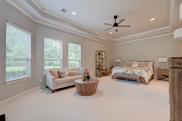 a living room with furniture and a window