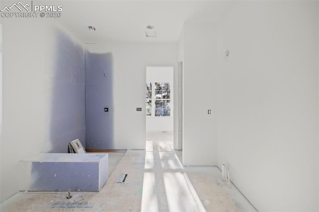 10697 Alamar Way Colorado Springs, CO 80908 - Photo 16 of 24 a bathroom with a bathtub