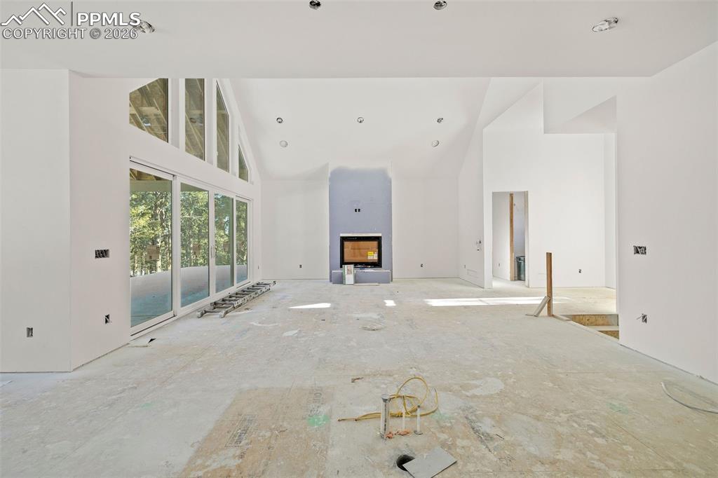 10697 Alamar Way Colorado Springs, CO 80908 - Photo 19 of 24 a view of an empty room with a window