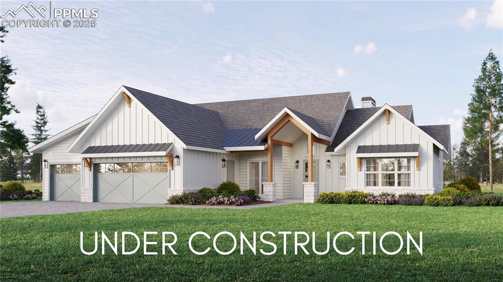 10697 Alamar Way Colorado Springs, CO 80908 - Photo 24 of 24 a front view of a house with a garden