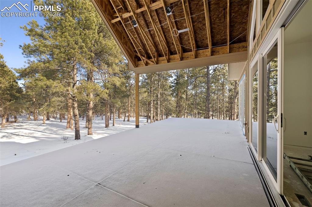 10697 Alamar Way Colorado Springs, CO 80908 - Photo 6 of 24 a view of a backyard of the house