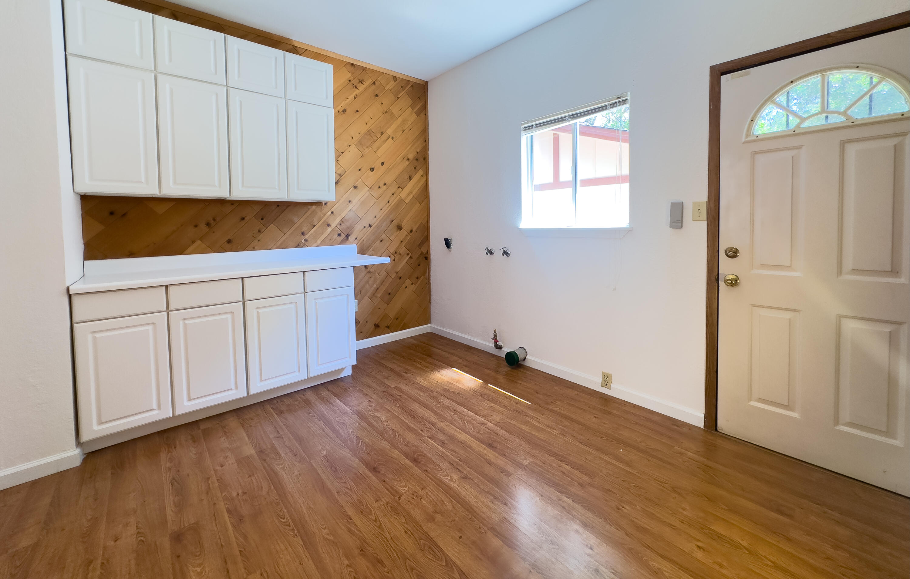 16588 Stanislaus Drive Redding, CA 96001 - Photo 18 of 53 a view of a kitchen with wooden floor and electronic appliances
