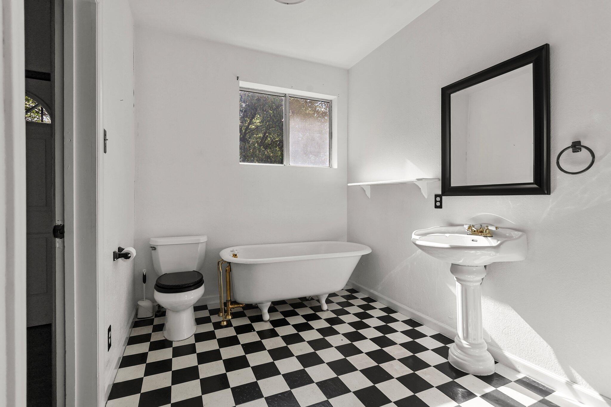 16588 Stanislaus Drive Redding, CA 96001 - Photo 19 of 53 a bathroom with a sink toilet and shower