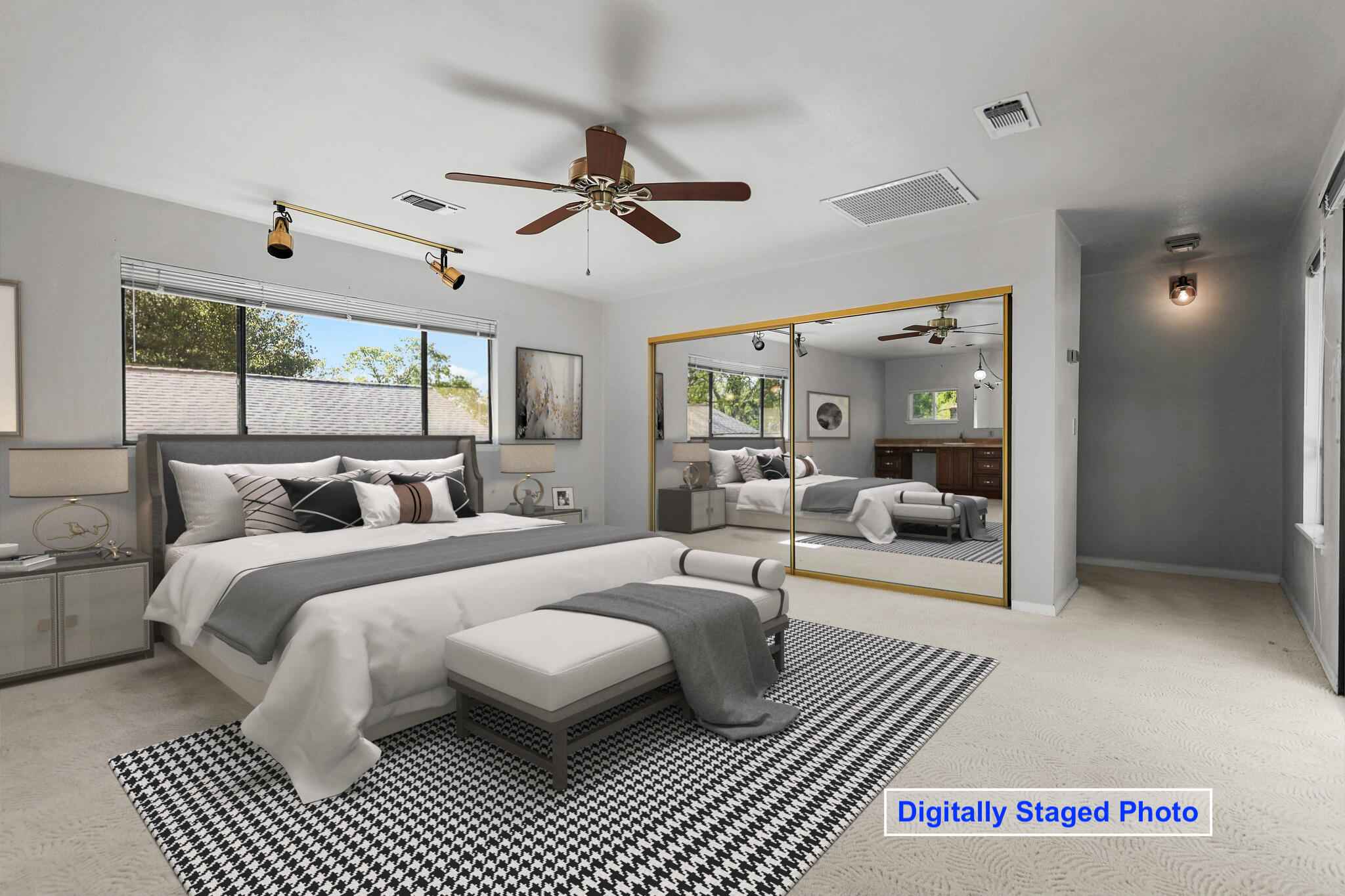 16588 Stanislaus Drive Redding, CA 96001 - Photo 31 of 53 a spacious bedroom with a large bed a chandelier and windows