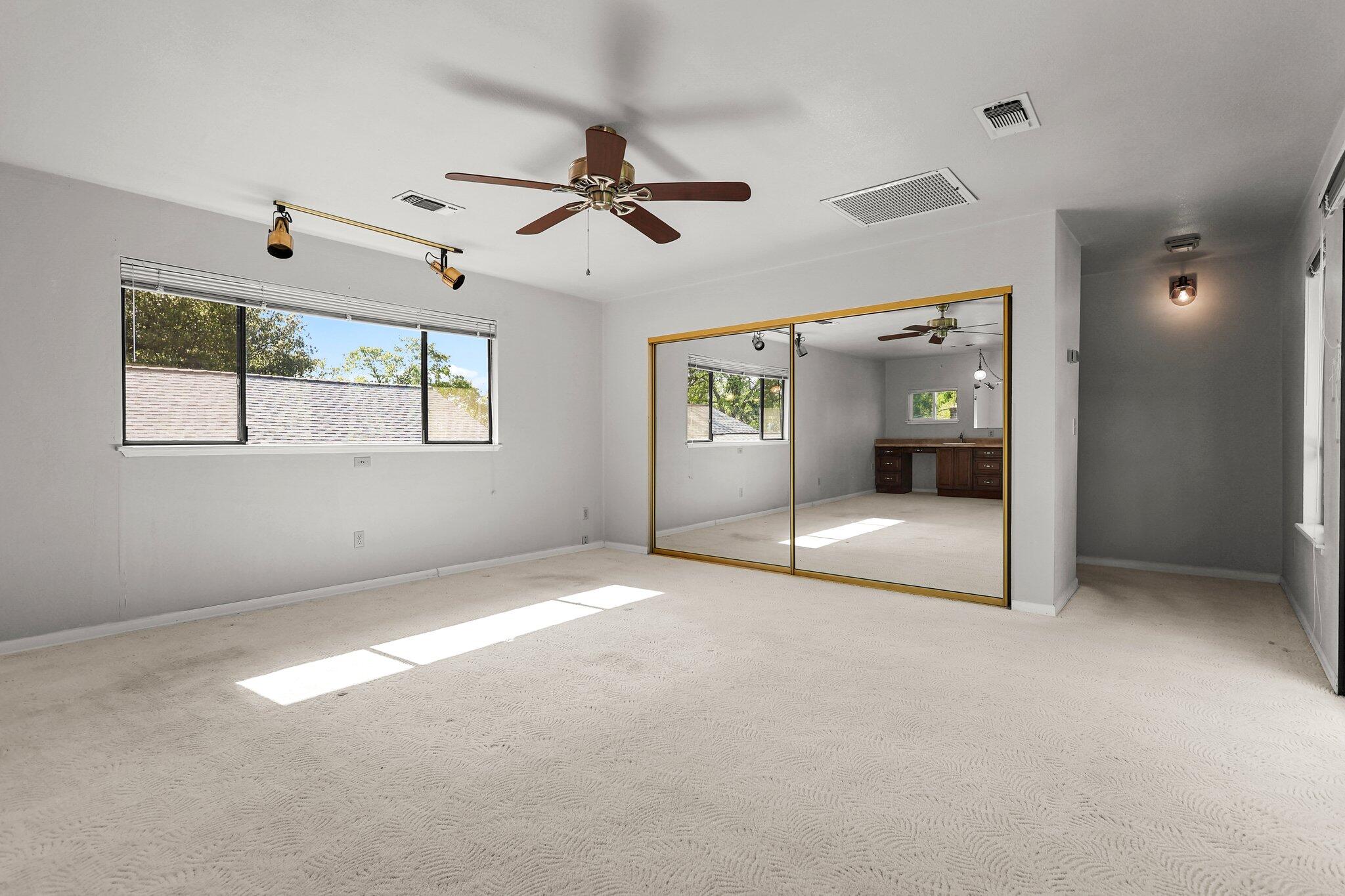 16588 Stanislaus Drive Redding, CA 96001 - Photo 32 of 53 a view of an empty room with a window