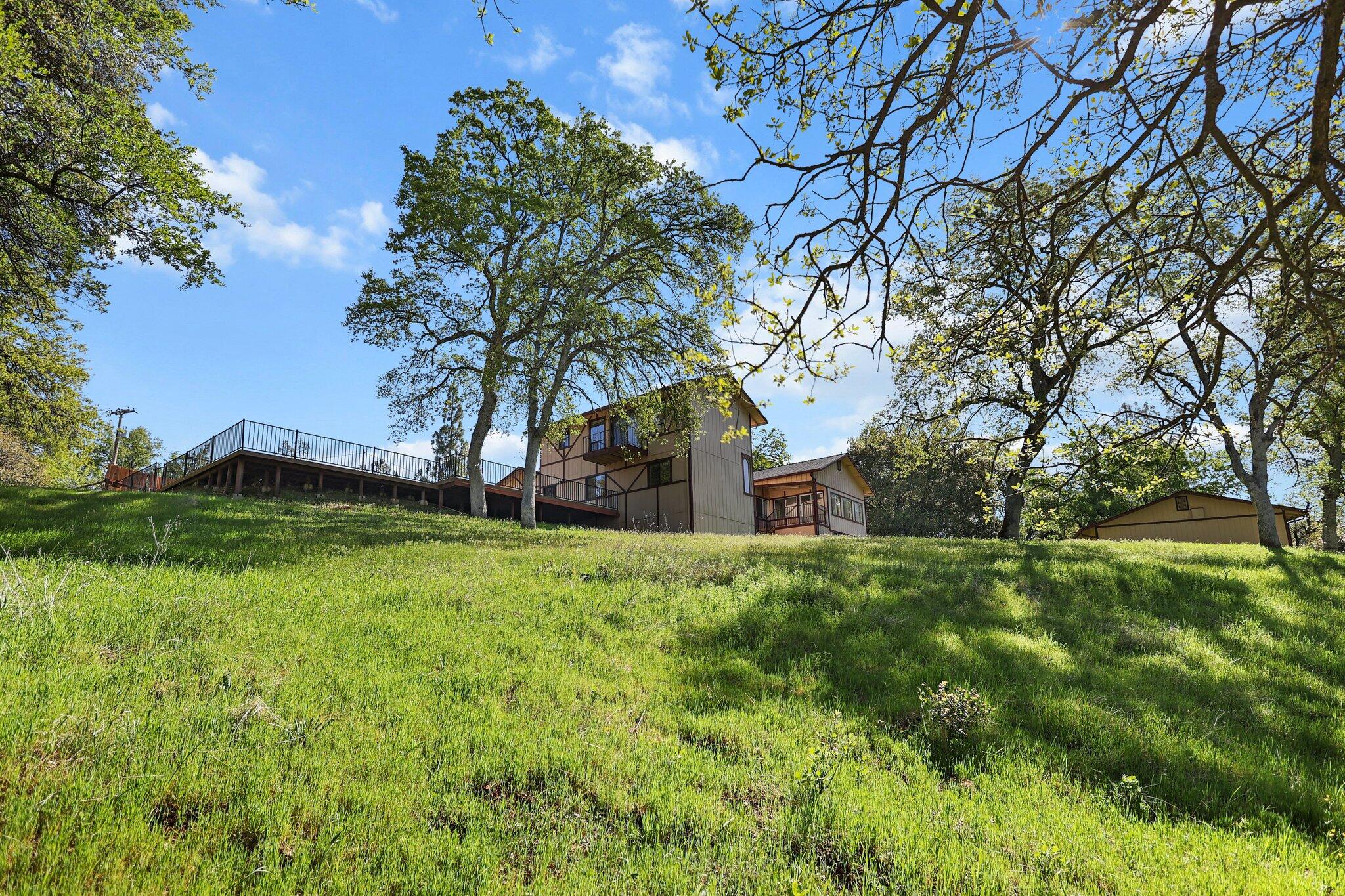 16588 Stanislaus Drive Redding, CA 96001 - Photo 44 of 53 a view of backyard with green space