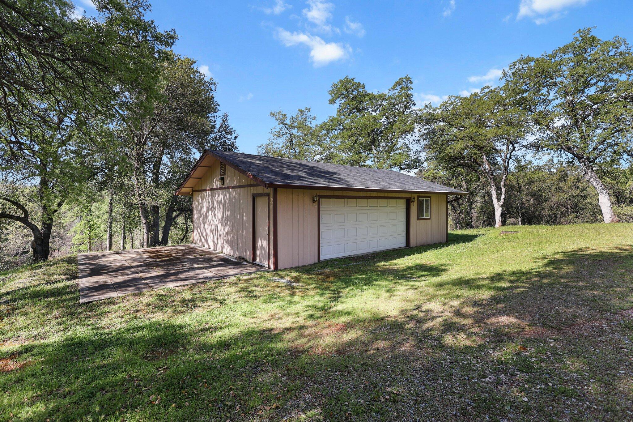 16588 Stanislaus Drive Redding, CA 96001 - Photo 5 of 53 a view of a house with a yard