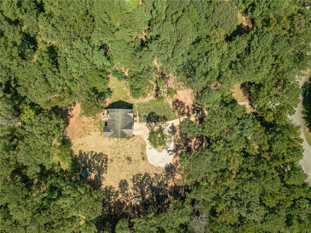 246 Azalea Farms Road Social Circle, GA 30025 - Photo 27 of 27 a view of a yard with trees