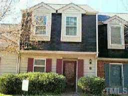 1501 Clermont Road, Unit T2 Durham, NC 27713 - Photo 1 of 1 front view of a brick house with a large windows