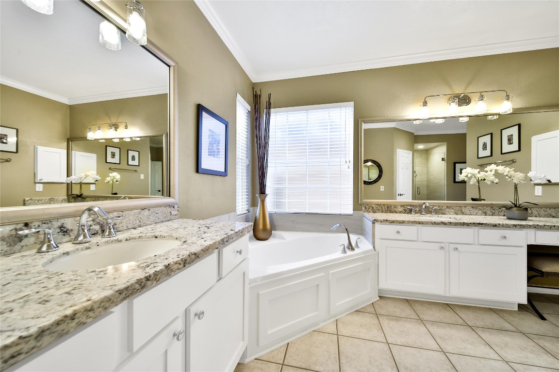 3622 Chessnut Glen Drive Spring, TX 77388 - Photo 21 of 38 a bathroom with a granite countertop sink mirror and bathtub