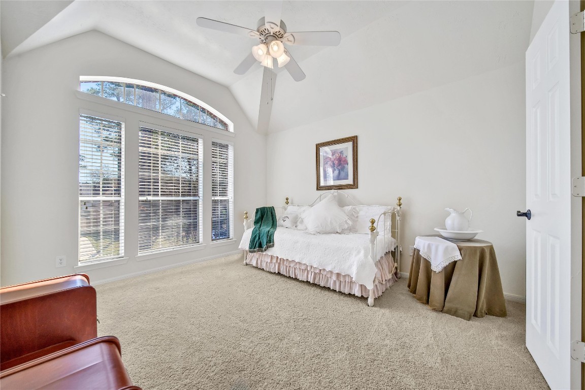 3622 Chessnut Glen Drive Spring, TX 77388 - Photo 28 of 38 a spacious bedroom with a bed and a large window