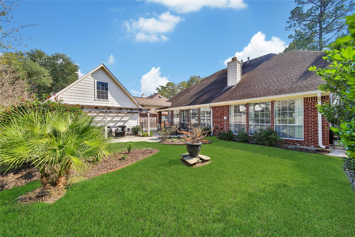 3622 Chessnut Glen Drive Spring, TX 77388 - Photo 35 of 38 a front view of a house with garden
