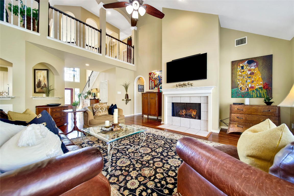 3622 Chessnut Glen Drive Spring, TX 77388 - Photo 7 of 38 a living room with furniture fireplace and a flat screen tv