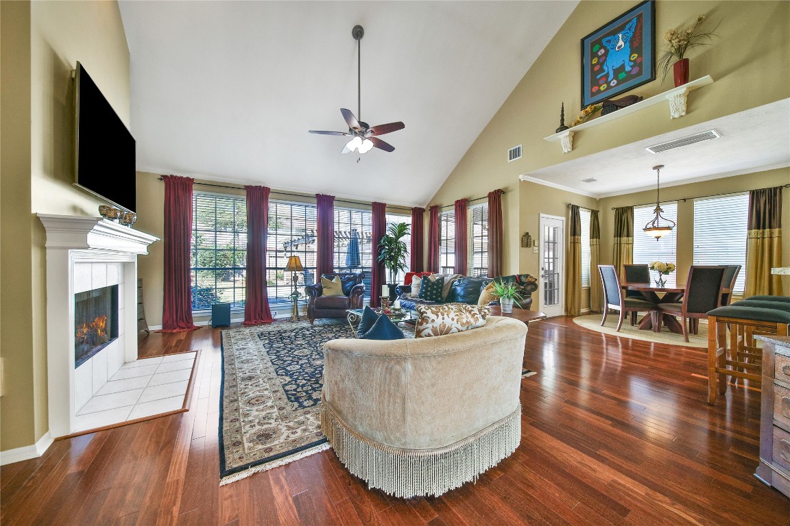 3622 Chessnut Glen Drive Spring, TX 77388 - Photo 9 of 38 a living room with fireplace furniture and a flat screen tv