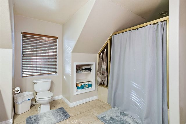 a view of a balcony with chairs