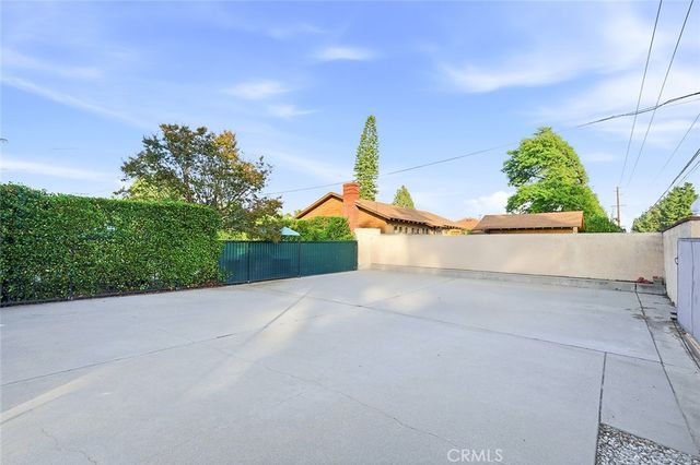 front view of a house with a street
