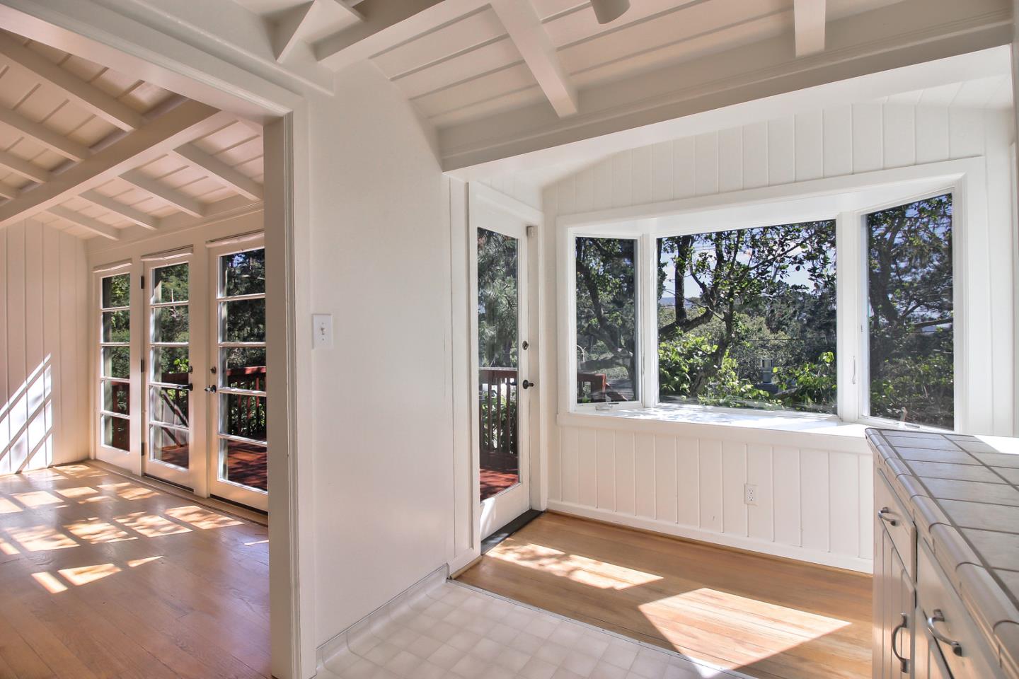2 San Carlos Street Carmel, CA 93921 - Photo 14 of 22 a view of an empty room with a window