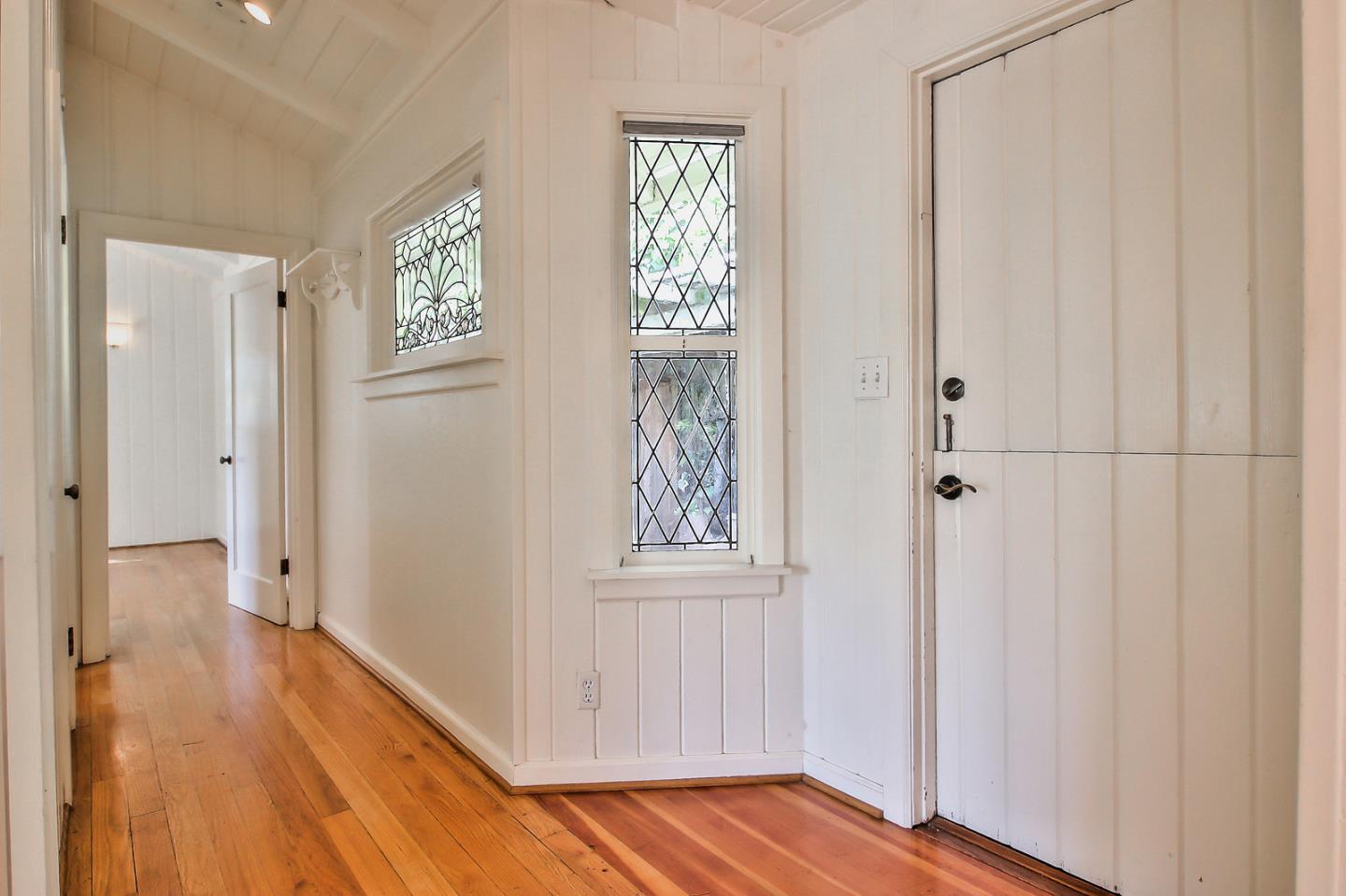 2 San Carlos Street Carmel, CA 93921 - Photo 16 of 22 a view of front door with wooden floor