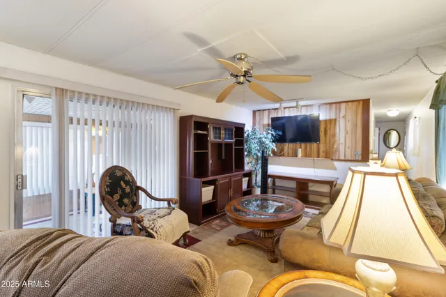 a living room with furniture and a window