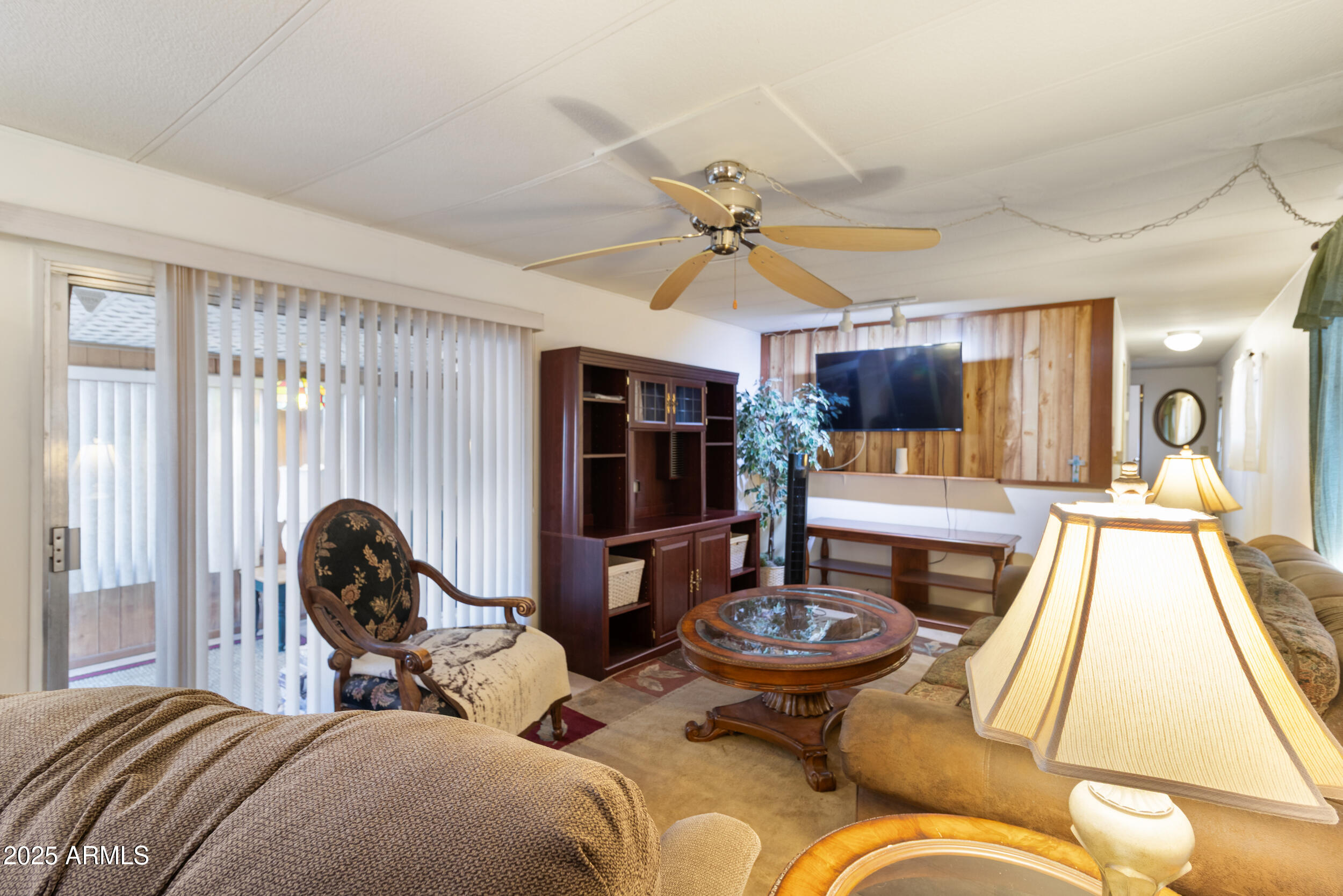 701 South Dobson Road, Unit 16 Mesa, AZ 85202 - Photo 11 of 55 a living room with furniture and a window
