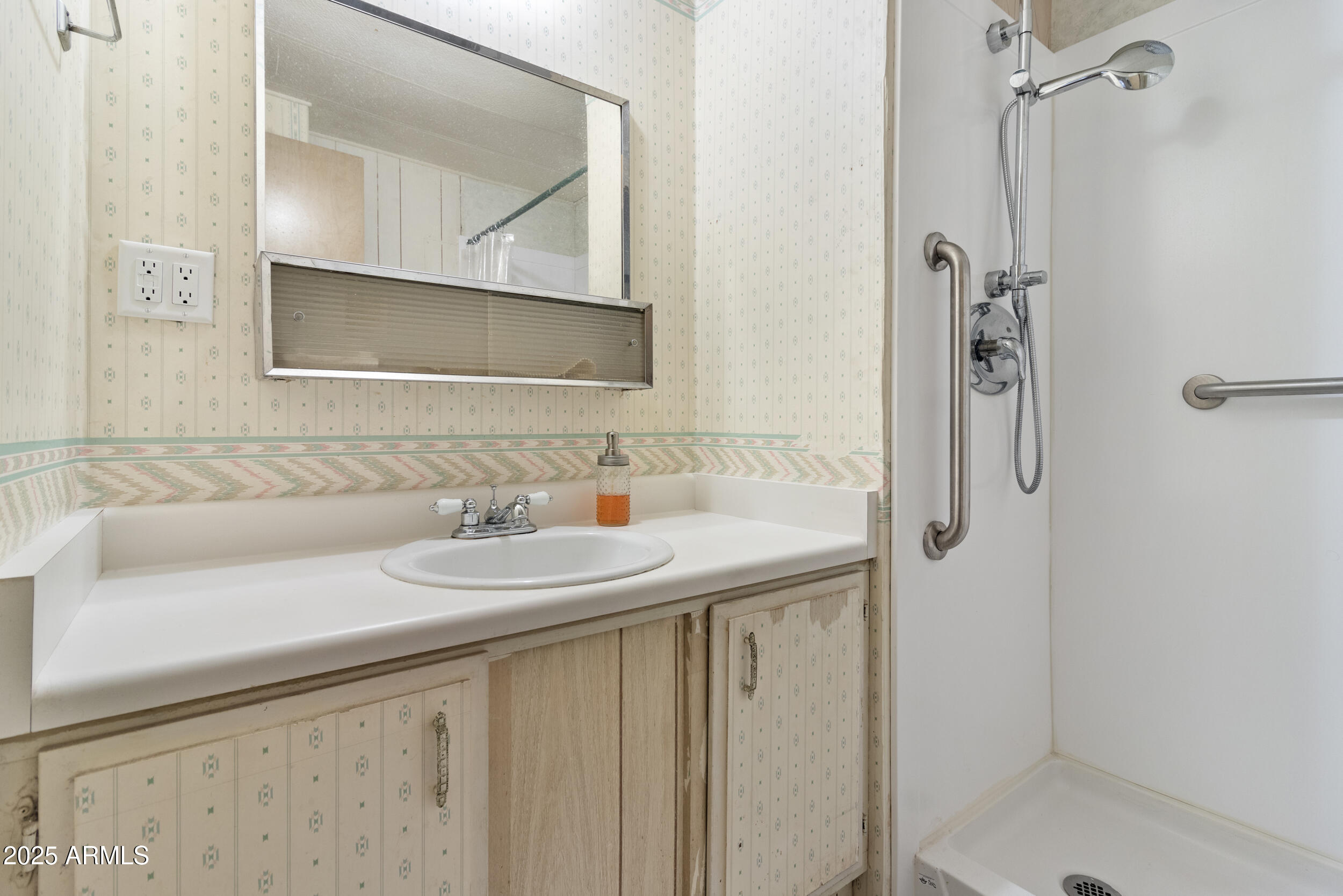 701 South Dobson Road, Unit 16 Mesa, AZ 85202 - Photo 21 of 55 a bathroom with a sink and a mirror
