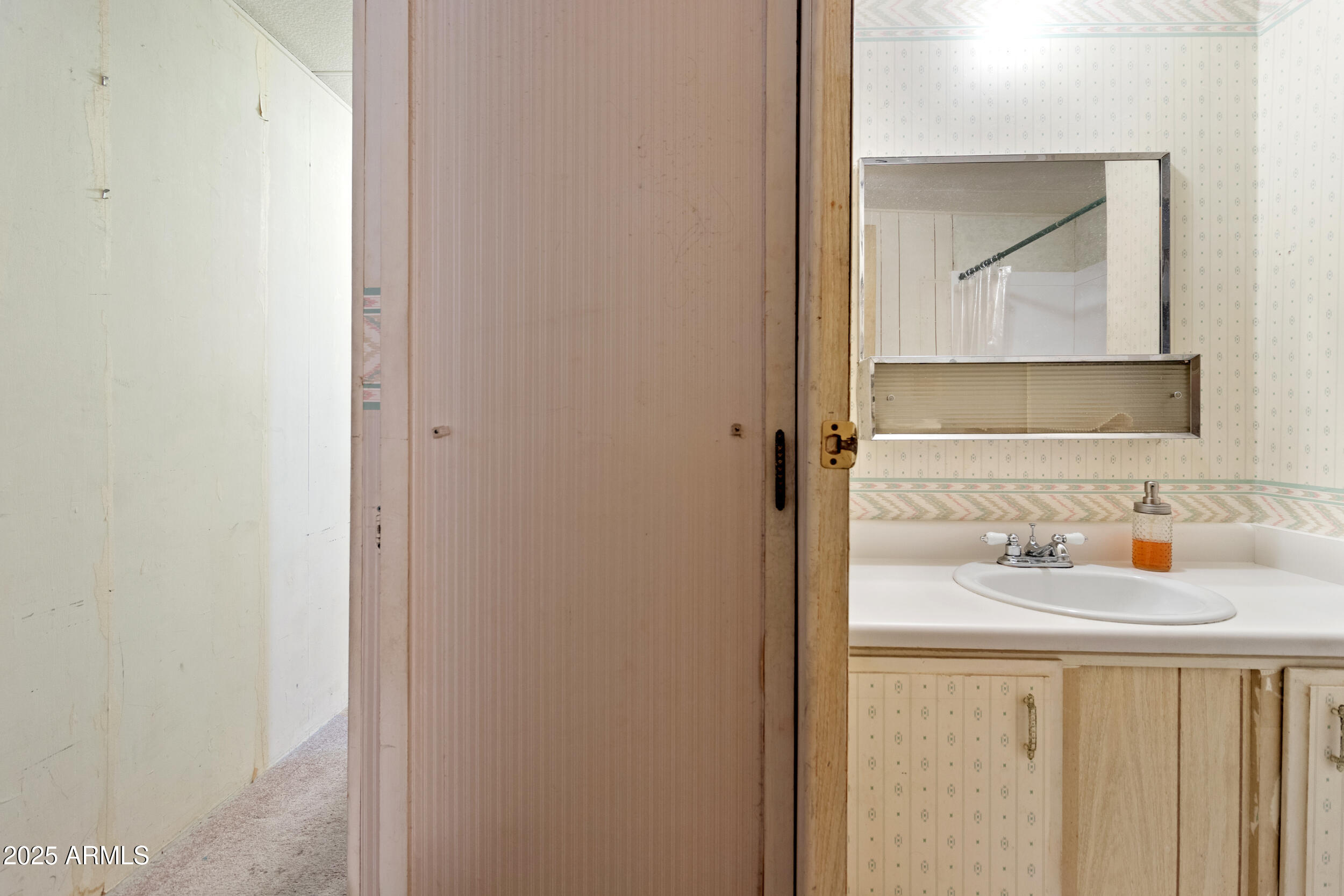 701 South Dobson Road, Unit 16 Mesa, AZ 85202 - Photo 22 of 55 a bathroom with a sink and a mirror