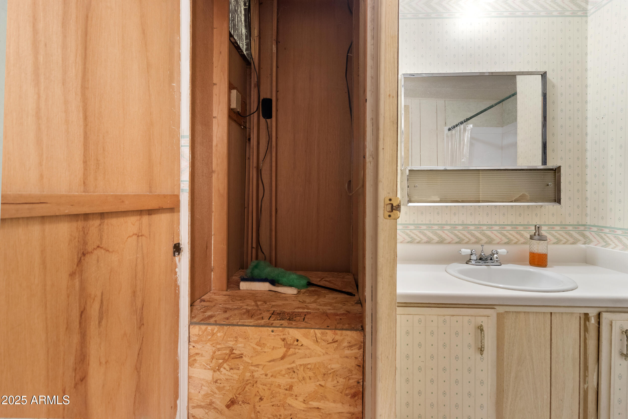 701 South Dobson Road, Unit 16 Mesa, AZ 85202 - Photo 23 of 55 a bathroom with a granite countertop sink and a mirror