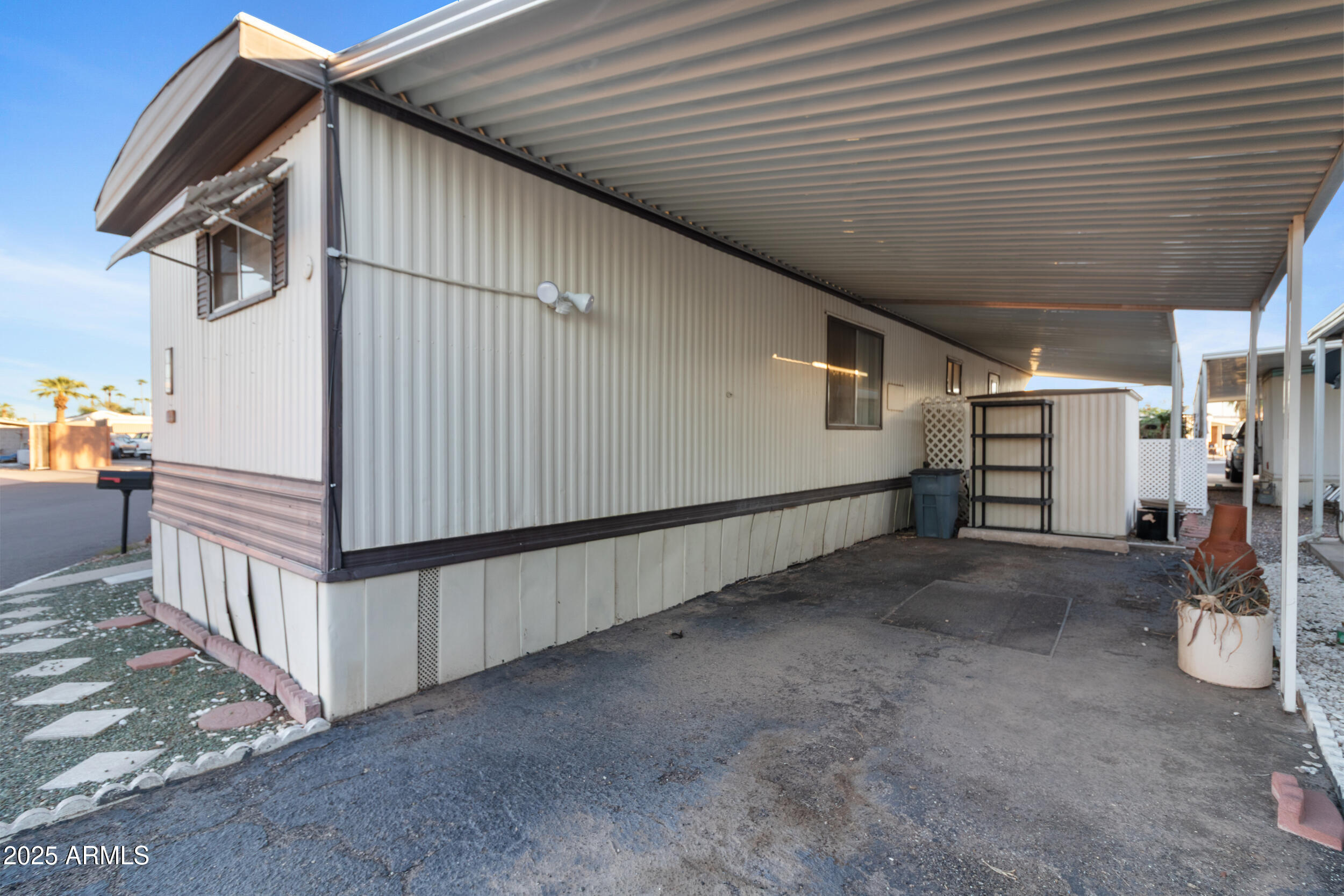 701 South Dobson Road, Unit 16 Mesa, AZ 85202 - Photo 4 of 55 a view of a garage