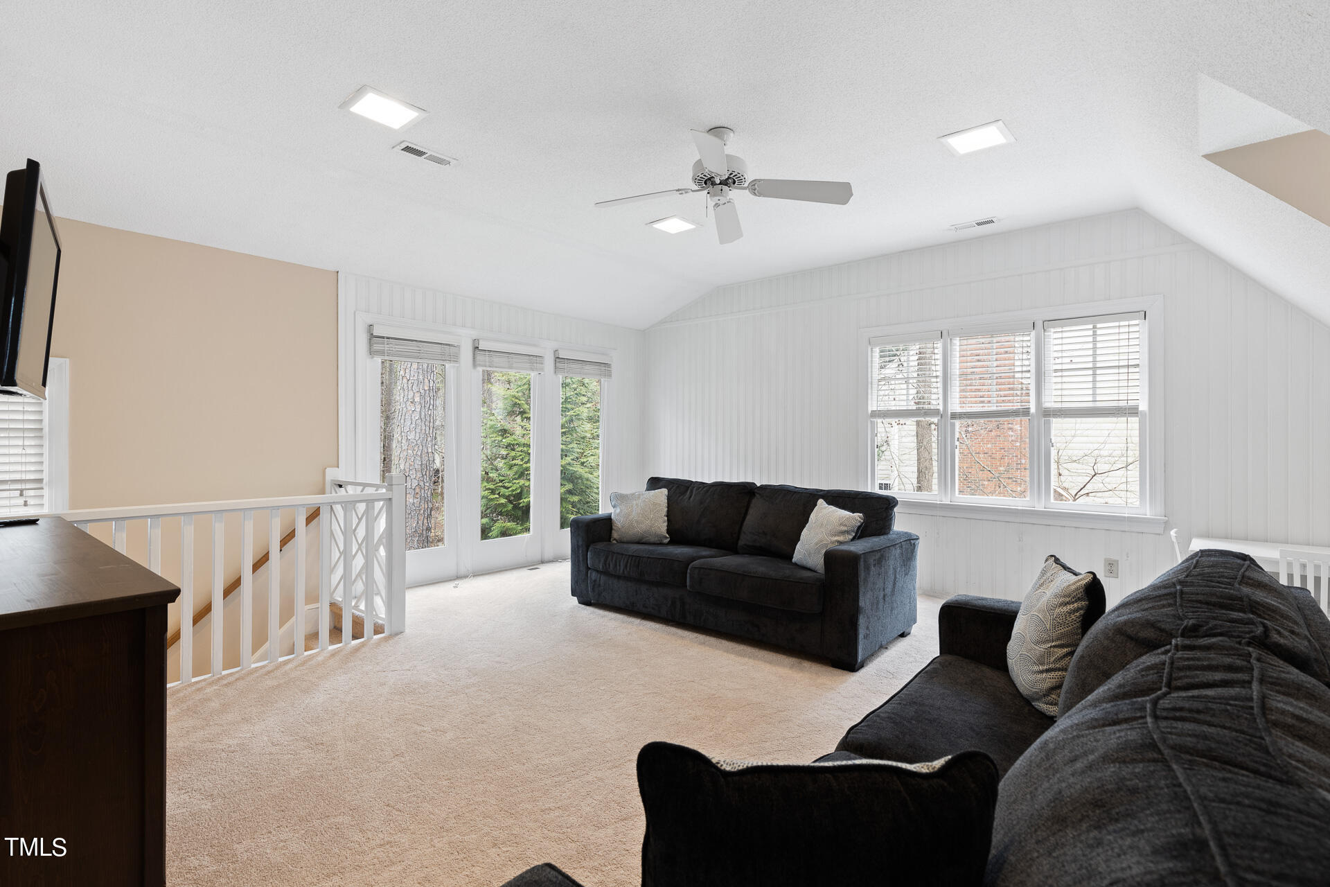 5504 North Hawthorne Way Raleigh, NC 27613 - Photo 29 of 37 a living room with furniture and a window