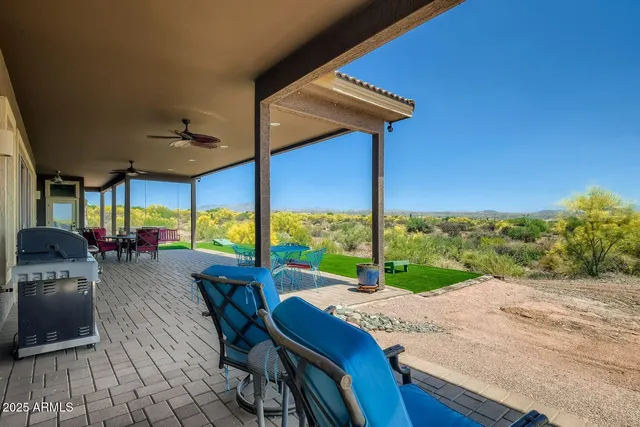 a view of outdoor kitchen and outdoor kitchen