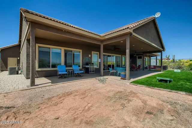 a view of a yard with an ocean view