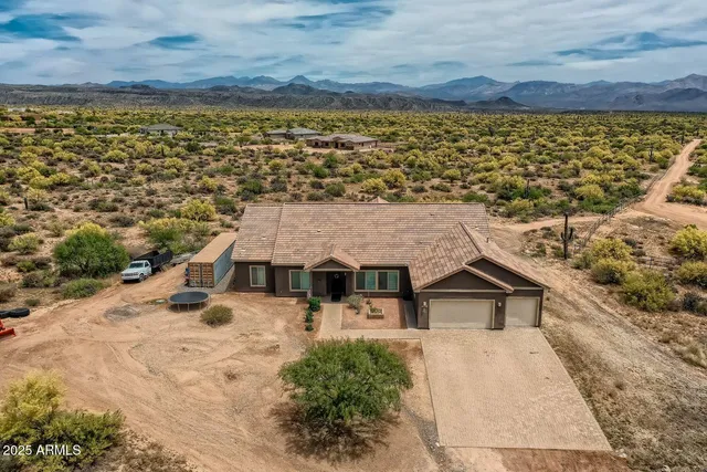a aerial view of a house with a terrace