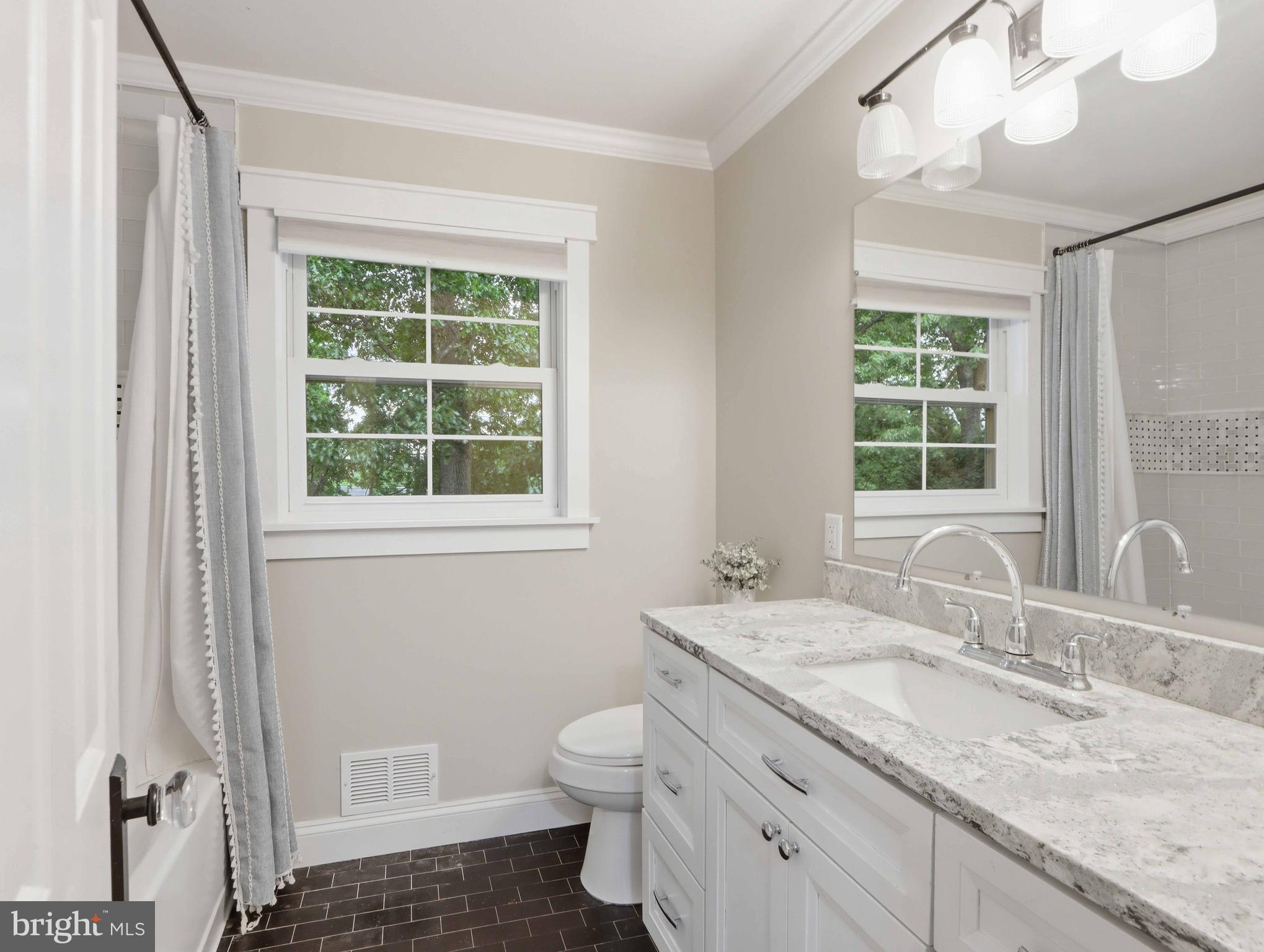 380 Sheffield Road Severna Park, MD 21146 - Photo 32 of 47 Crisp and bright hall bath.